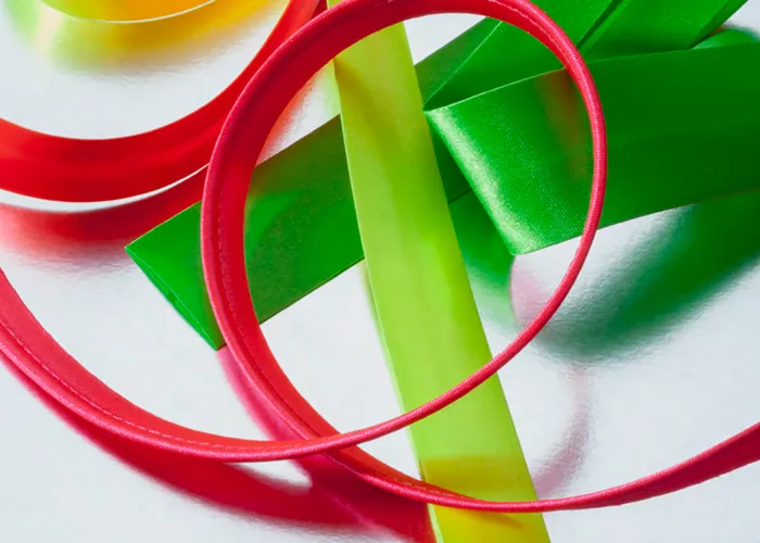 Cinta al bies fluorescente para equipos de protección
